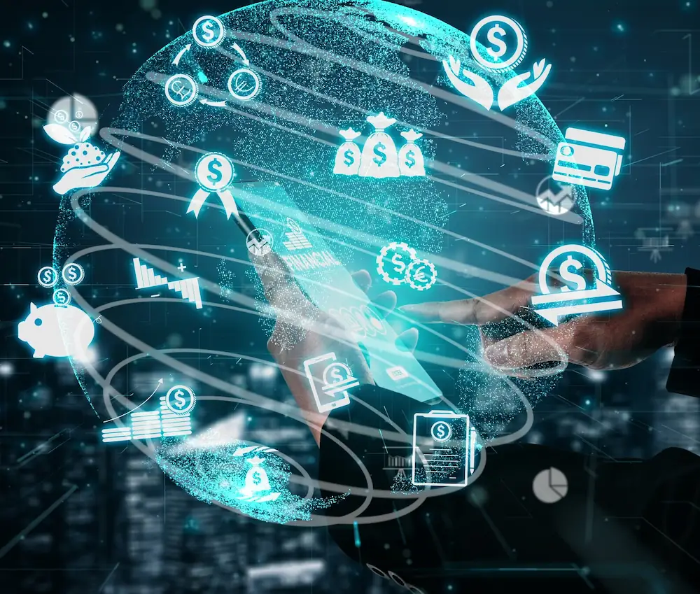 ADOBESTOCK_464478245 | Cekome Main touchant une interface holographique financière avec des icônes de gestion d'argent et de transactions numériques.