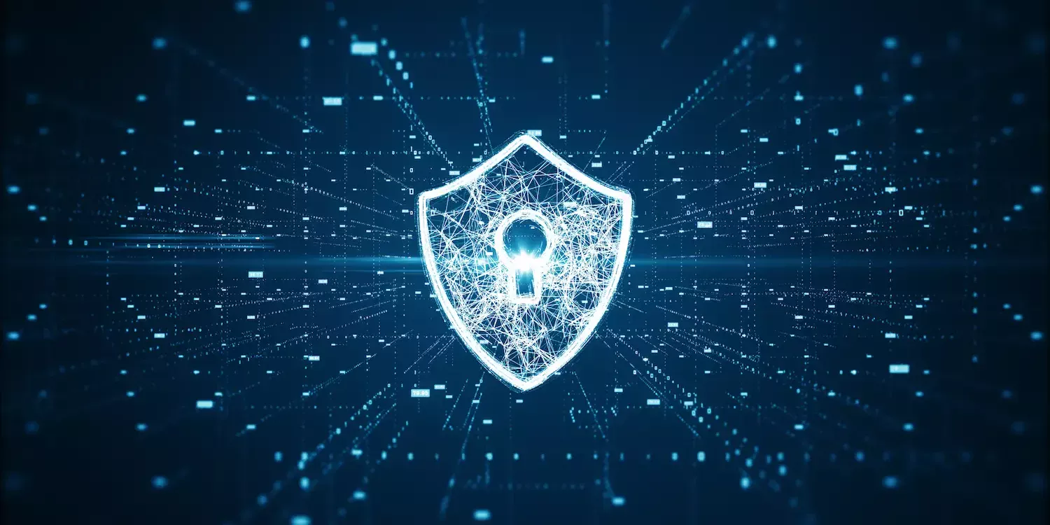 Icône de cybersécurité en forme de bouclier avec cadenas, symbolisant la protection des données numériques.