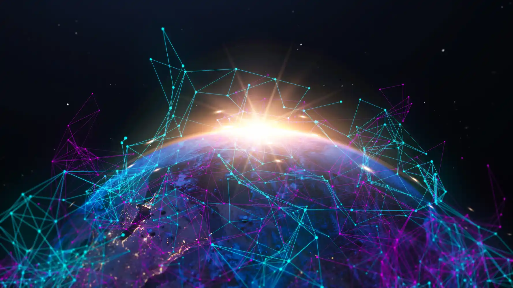 ADOBESTOCK_410283635 | Cekome Planète Terre vue de l’espace au lever du soleil, recouverte de connexions numériques représentant un réseau global d’agents autonomes