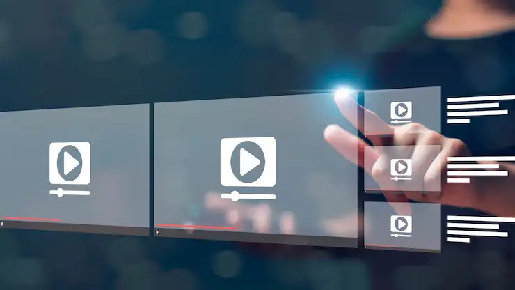 VIDEO IA | Cekome Main sélectionnant une vidéo sur une interface numérique interactive avec icônes de lecture